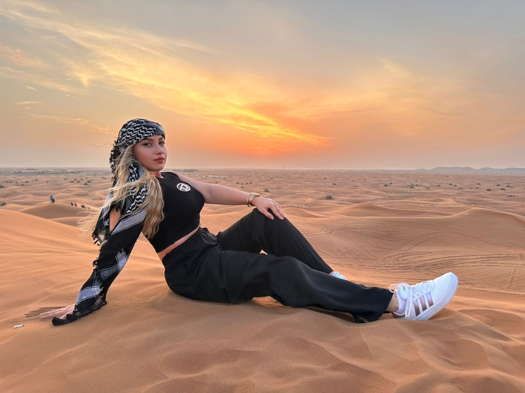 Evening Desert Safari with Camel Ride Sandboard & BBQ Dinner