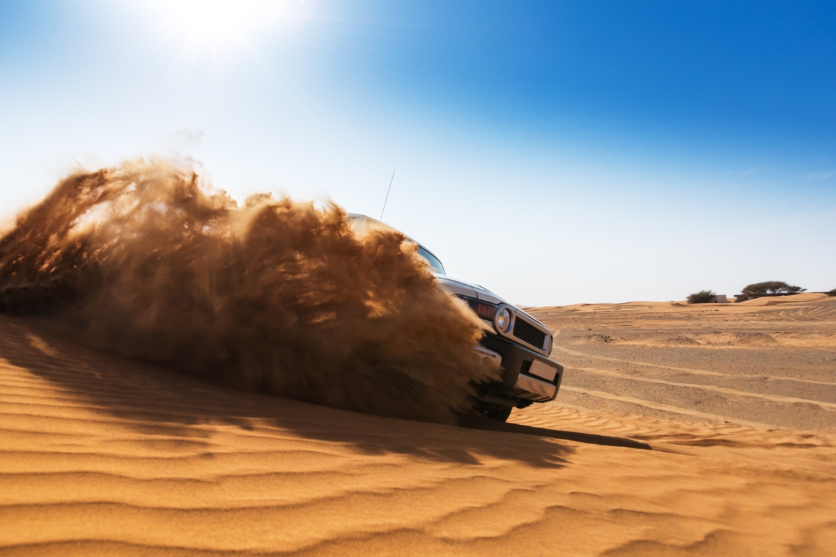 Dubai Desert Safari Red Dune Bashing, Sand Boarding, Camel Riding With Live Entertainment & BBQ Dinner